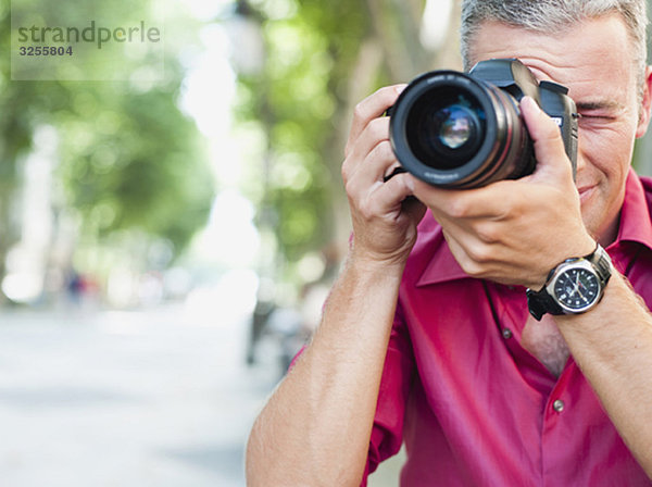 Kameramann beim Fotografieren