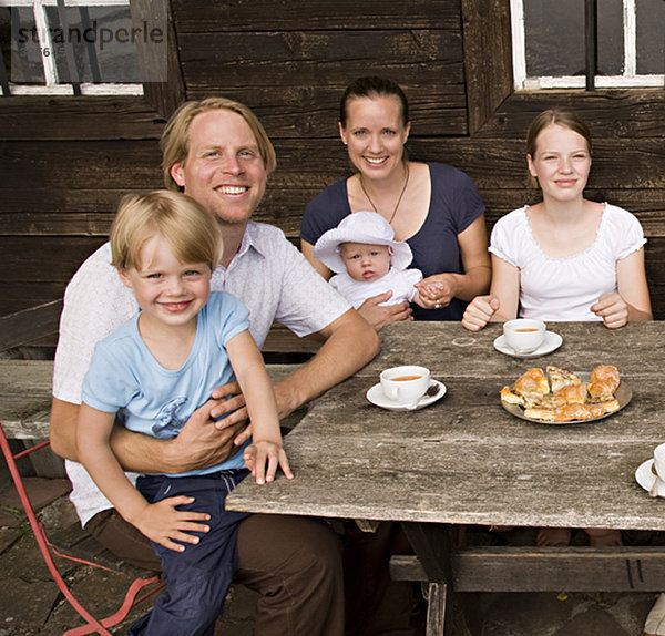 Familie mit drei Kindern