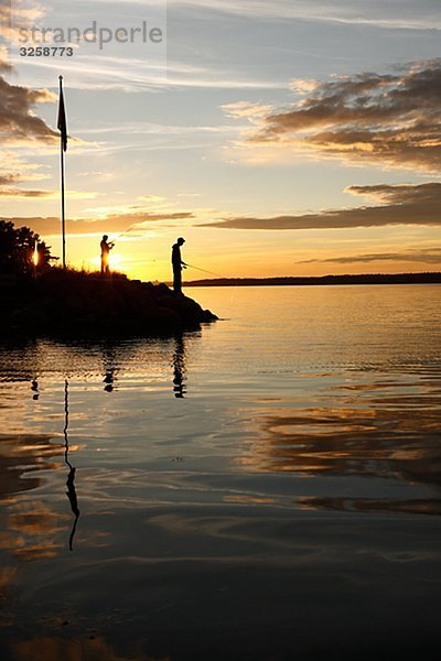 Sonnenuntergang Silhouette Mensch angeln zwei Personen 2