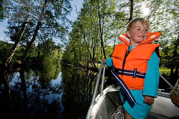 A boy in a boat  Sweden.