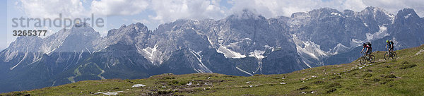 Italy  Dolomites  Couple mountainbiking