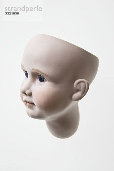 Seitenansicht des Kopfes einer Puppe