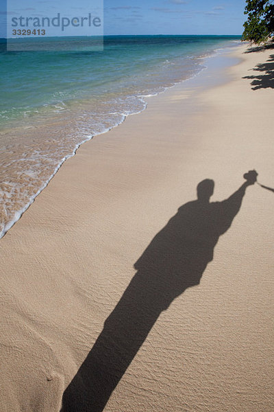 Schatten am Strand.