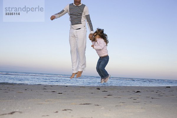 Familie am Strand.