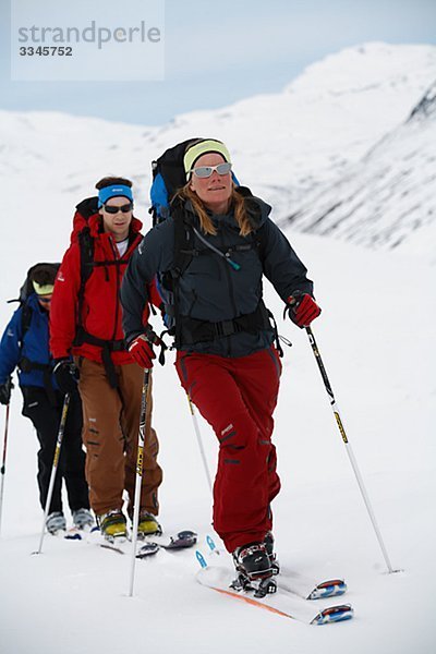 Three skiers  Abisko  Lapland  Sweden.