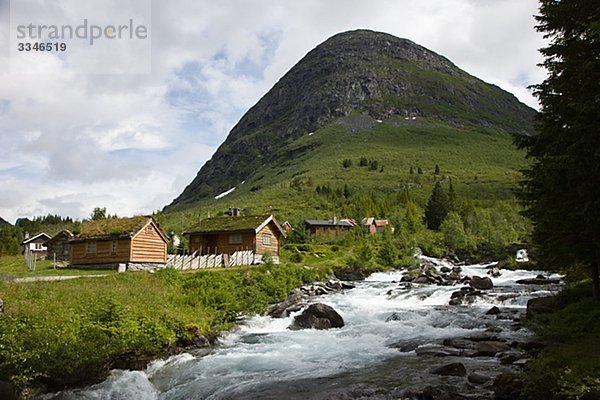 Houses by a stream  Norway.