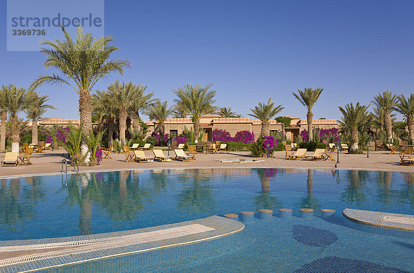 Nordafrika Palme Zimmer Schwimmbad niemand Hotel Querformat Garten Veranda Afrika Bougainvillea Marokko