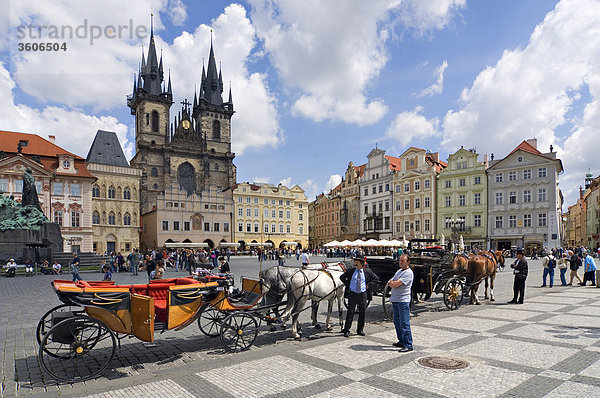 Horse-drawn carriages at the Old Town Square  Prague  Czech Republic