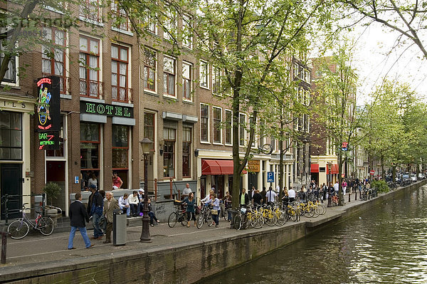 Pedestrians in the red-light district  Amsterdam  Netherlands