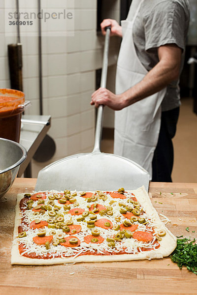 Pizzabäcker in der Großküche