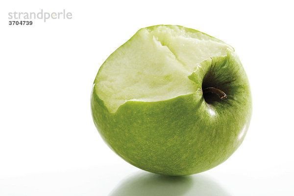 Angebissener grüner Apfel