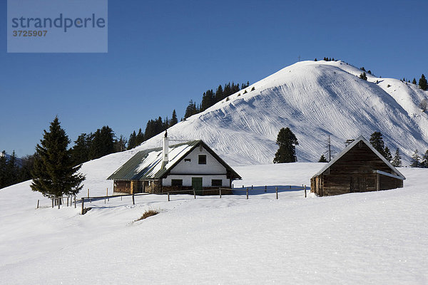 Baerenhauptalm hut  Mt Hirschhoerndlkopf in winter  Jachenau  Bavaria  Germany