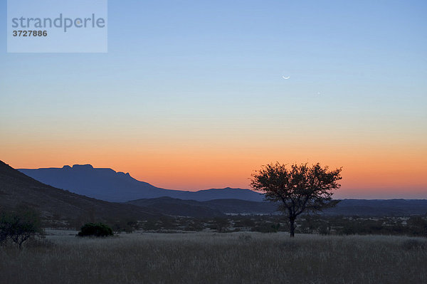 Sonnenuntergang auf der Westseite des Brandbergs  Namibia  Afrika