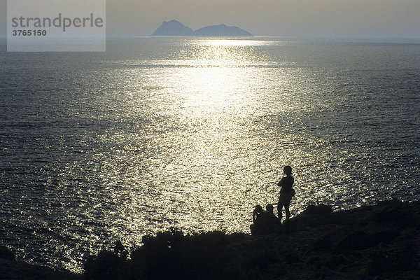 Two people silhouetted  Crete  Greece
