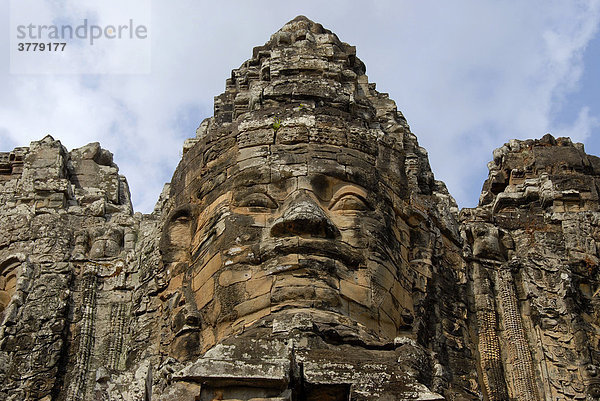 Avalokiteshvara Gesicht einer Khmer Figur aus Stein über dem Südtor South Gate Angkor Thom Siem Reap Kambodscha