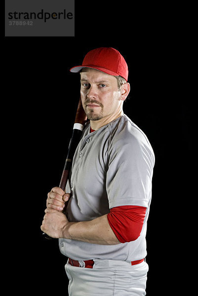 Ein Baseballspieler  Porträt  Studioaufnahme