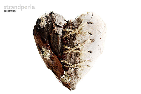 Zusammengenähtes Herz aus Baumrinde  Symbolfoto Umweltschutz