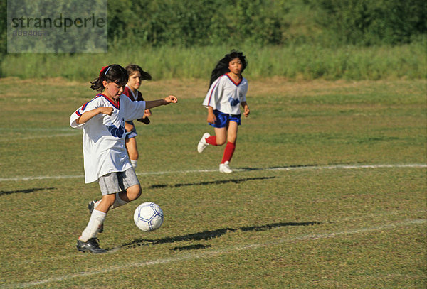 Mädchenfußballmannschaft in Aktion  USA