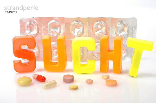 Leere Tablettenverpackung  Schriftzug Sucht  Symbolbild Medikamentensucht