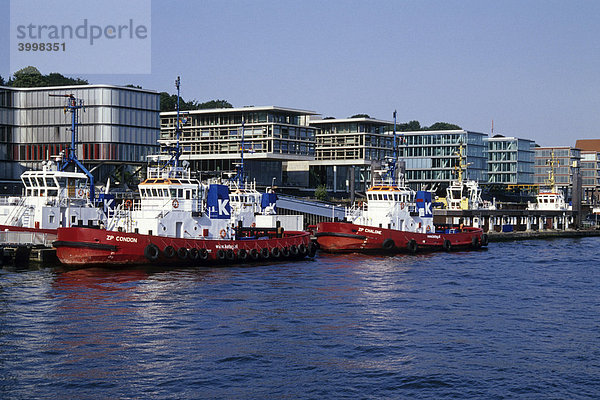 Schlepper und moderne Bürobauten  Boote an Schlepperstation  Elbe Fluss  Neumühlen  Hamburger Hafen  Hansestadt Hamburg  Deutschland  Europa