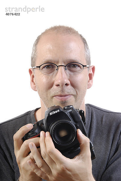 Fotograf mit digitaler Spiegelreflexkamera