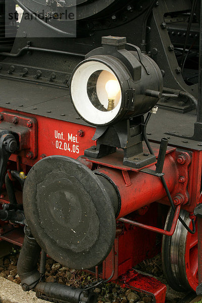 Scheinwerfer einer historischen Dampflokomotive