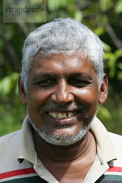Mann  Portrait  indischer Abstammung  Guyana  Südamerika