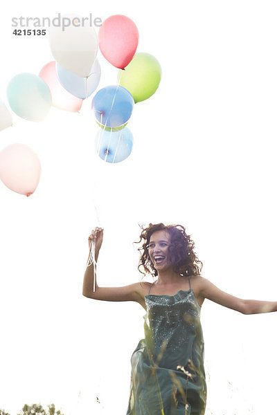 Frau mit Luftballons