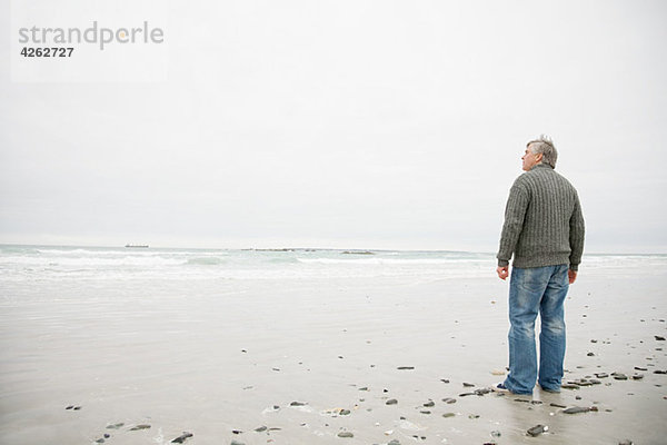 Mann am Strand