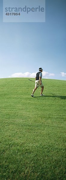 Golfer zu Fuß