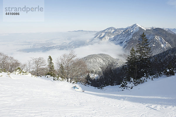 Germany  Man skiing on herzogstand mountain