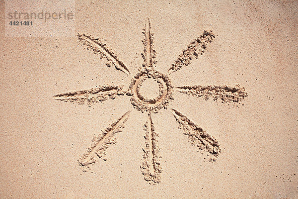 Sonnenzeichnung auf sand