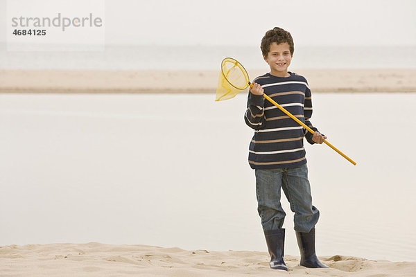 Strand Junge - Person halten Netz angeln jung