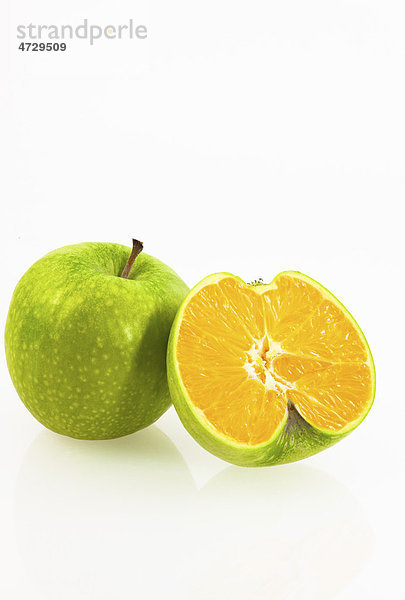Apfel und Kreuzung aus Apfel und Apfelsine  Symbolbild Genobst