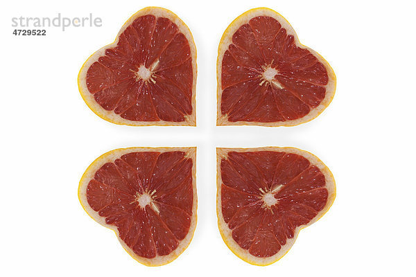 Grapefruits  Grapefrüchte  Pampelmusen  in Herzform  bilden Kleeblattform