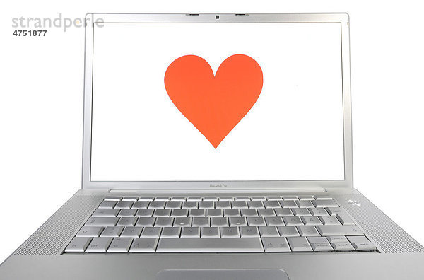 Herz auf Apple MacBook Pro Monitor  Symbolbild Partnervermittlung online