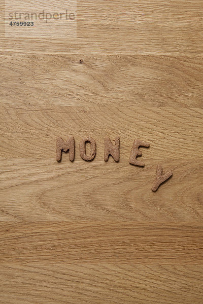 Money  Schriftzug aus Keksen