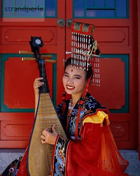 Asien  Asien  China  Chinesisch  Kostüm  Kopfschmuck  Urlaub  Instrument  Landmark  Musik  Außenaufnahme  Menschen  Tourismus  traditionelle  T