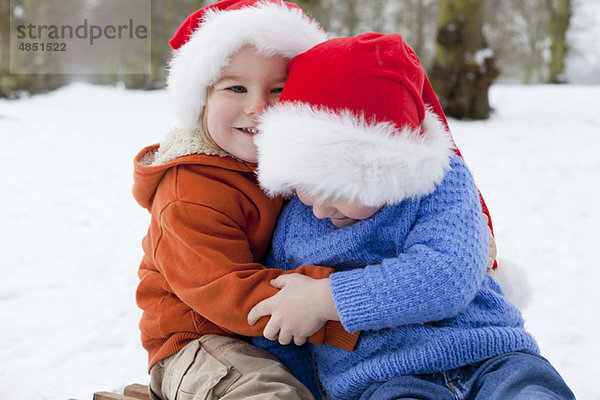 umarmen Junge - Person Hut Weihnachten 2