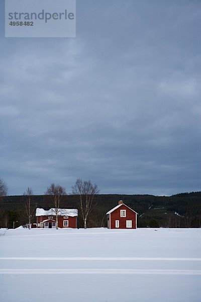 Red wooden houses  Norrland  Sweden.