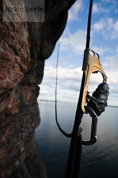 Tightrope hängen von cliff