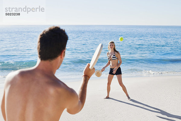 Strand  spielen  Tennis