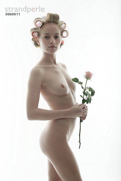 Nackte Frau mit einem rosa rose