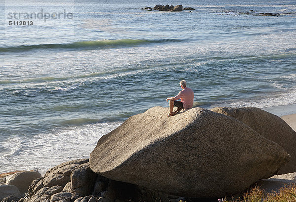 sitzend  Mann  Strand