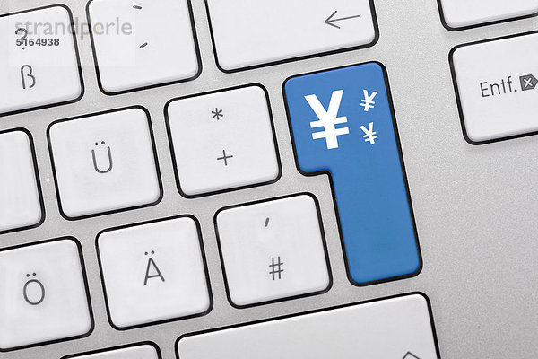 Abbildung der Tastatur mit blauer Taste mit Yen-Symbol  Nahaufnahme