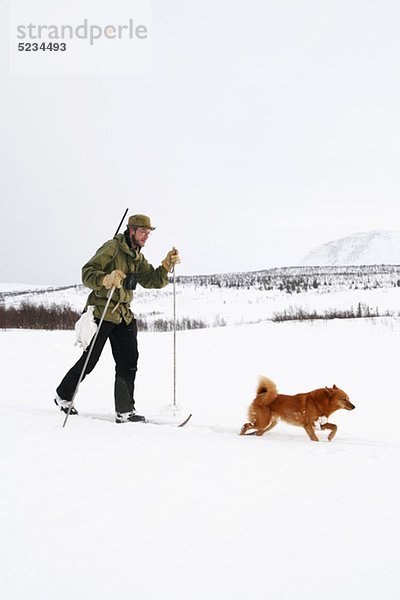 Jäger mit Hund