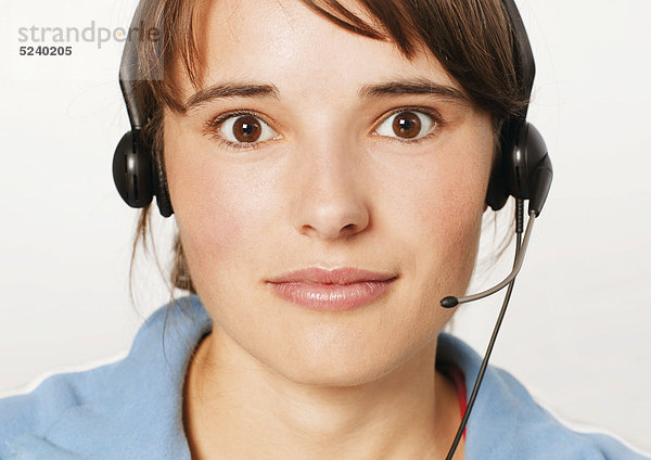 Frau mit Headset  Porträt