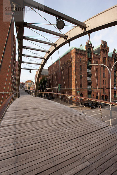 Speicherstadt  footbridge and historic warehouses  Hamburg  Germany