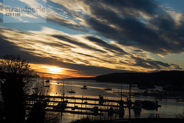 Silhouetted boats on sea  Salt Spring Island  British Columbia  Canada
