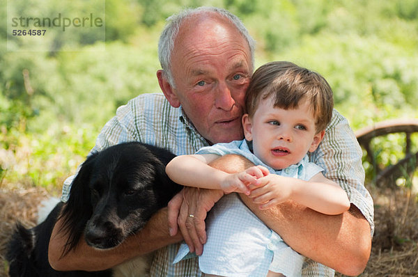Grandfather and Grandson mit Hund  Porträt
